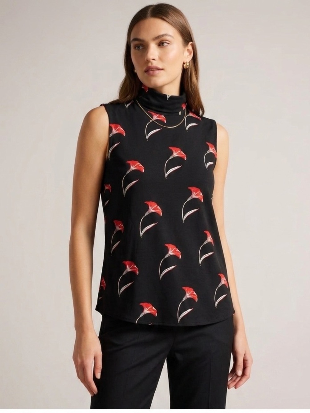 Ann Taylor || womanโs sleeveless womanโs floral blouse Sz Large